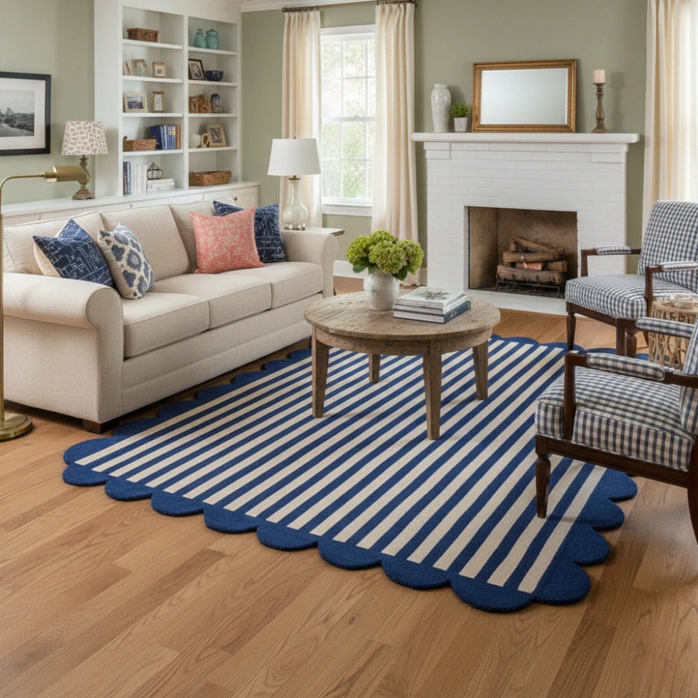 Navy blue and ivory scalloped border hand tufted area rug styled in a living room for elegant home decor