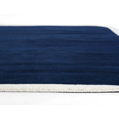 Pile thickness of Hand-tufted navy blue wool area rug with cream border – modern rectangular carpet for living room or bedroom