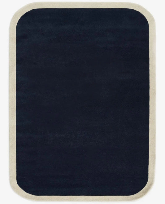 Hand-tufted navy blue wool area rug with cream border modern rectangular carpet for living room or bedroom