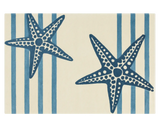 Hand-tufted navy starfish area rug on ivory background