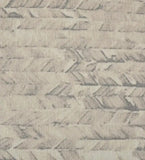 close-up of neutral chevron patterned luxury handwoven rug by Mannat Rugs