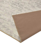 Luxury neutral chevron patterned rug with textured beige backing, elegant home decor accent