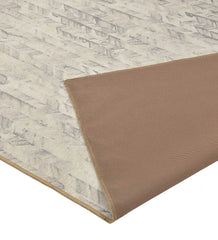 Washable rug with timeless chevron design.