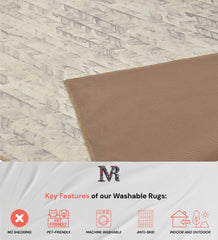 Minimalist style rug in neutral chevron pattern.