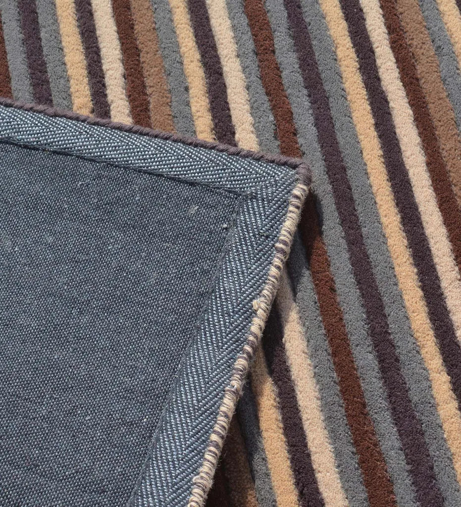 Contemporary hand-tufted wool rug with neutral stripe pattern