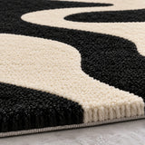 Noir current wool rug
