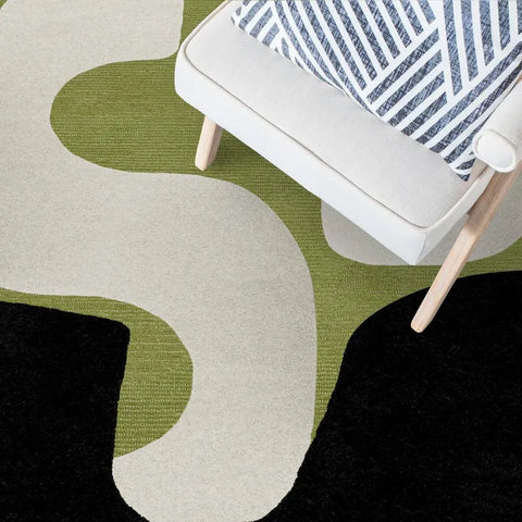 Minimalist modern rug featuring geometric abstract design.