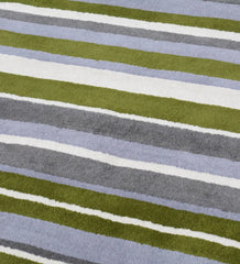 Hand-tufted wool area rug featuring soft modern stripe design.