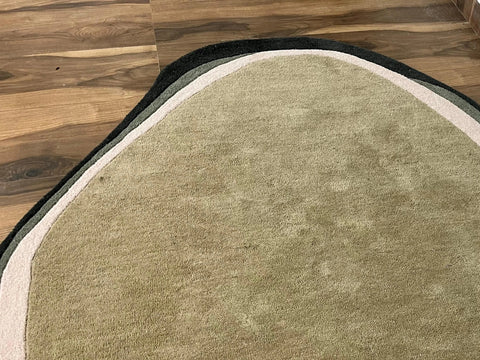Contemporary organic style rug with soft wool texture.