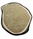 Organic shape hand-tufted iregular wool rug.