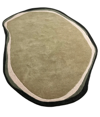 Organic shape hand-tufted iregular wool rug.