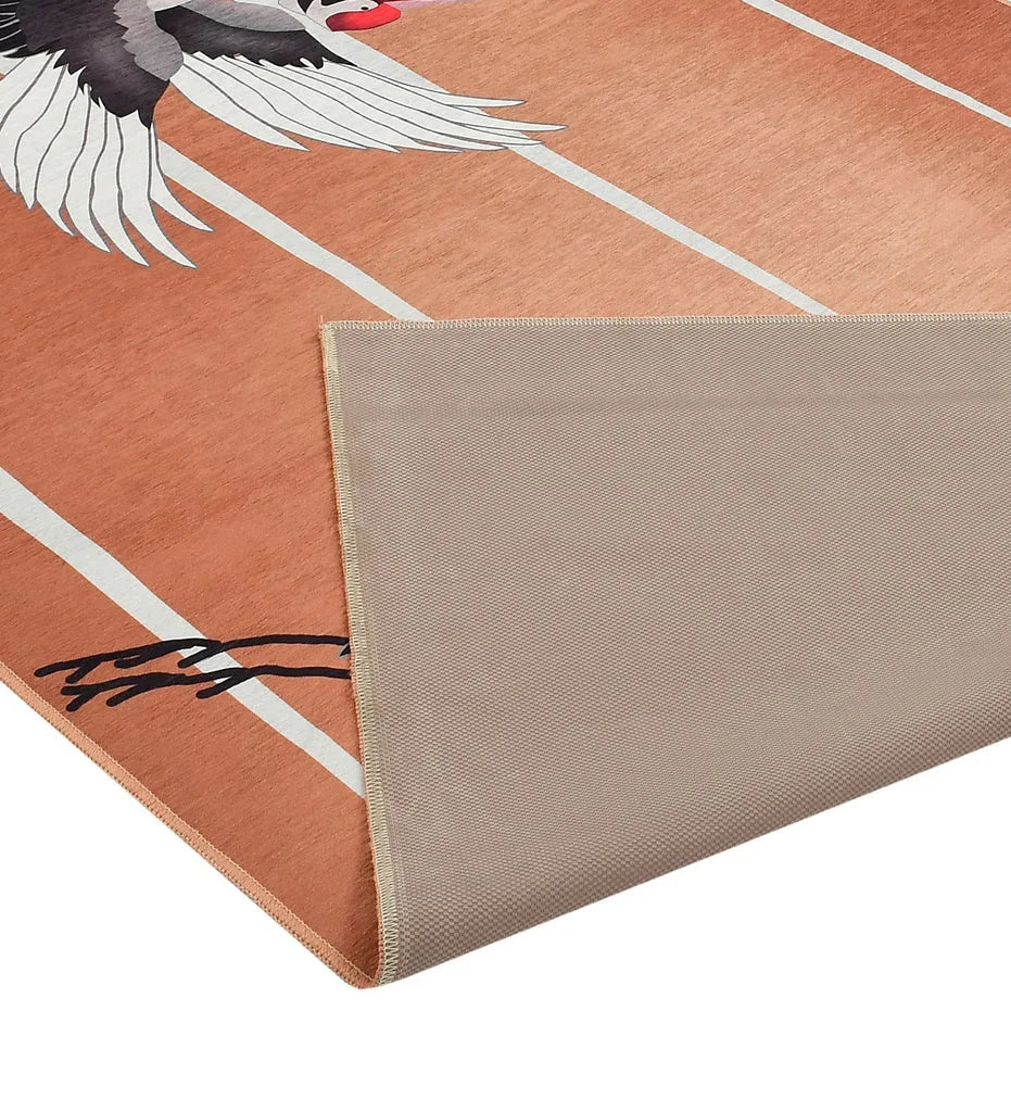 Durable bird patterned rug for cottage-style interiors.
