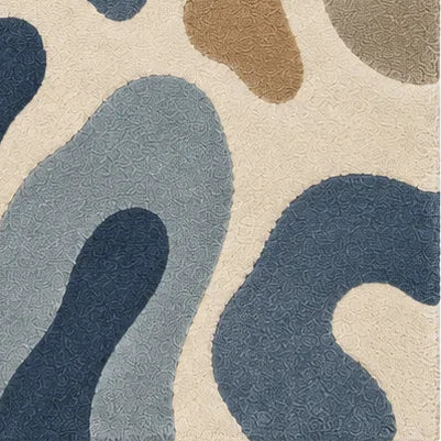 Blue and ivory abstract pebble pattern on hand-tufted wool rug for a dining room, 8x10 size