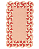 Hand-tufted pink Christmas rug with red peppermint border.