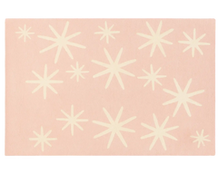 Blush pink festive wool rug with modern star holiday design