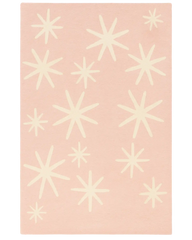 Pink Christmas rug with hand-tufted ivory starburst pattern