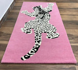 Playful leopard print rug for modern eclectic interiors.