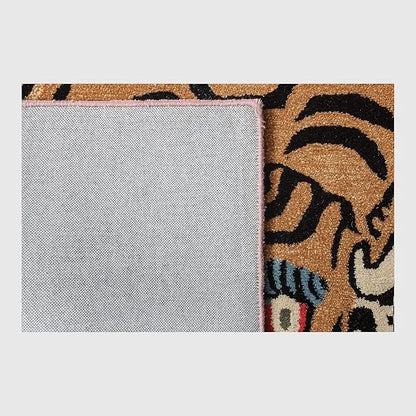 Textured fabric swatch with a tiger pattern on a plain background