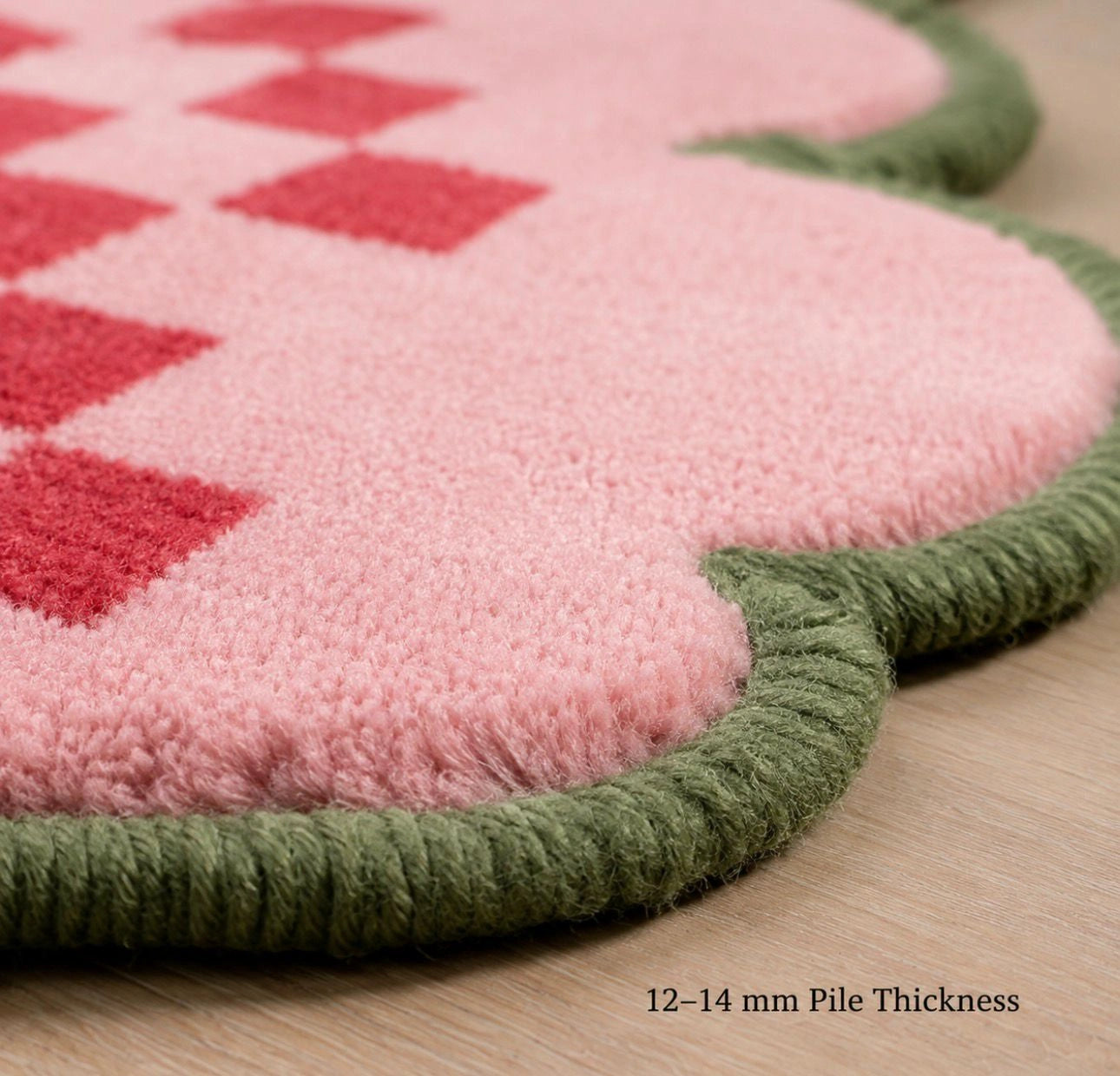 Pink checkerboard scallop wool rug