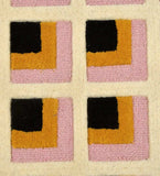 Luxury wool rug with artistic geometric pink and mustard design