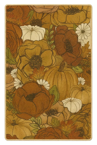 Pumpkin and floral autumn harvest rug in warm rust and gold tones.