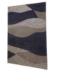 Modern purple and beige area rug featuring layered wavy texture, stylish home interior centerpiece.
