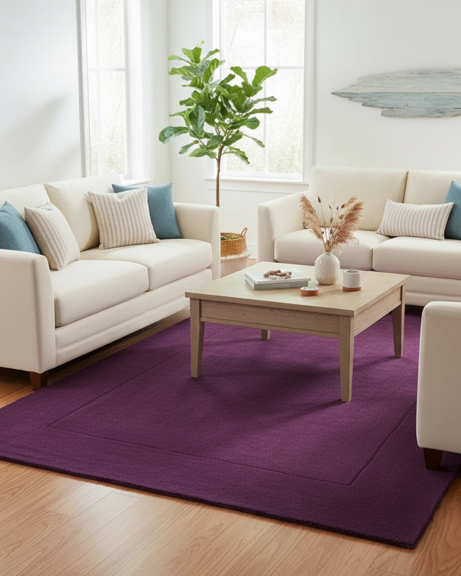 Purple solid minimalist modern plum design area rug with a hand-tufted finish, styled in a living room to add a sleek, contemporary, and elegant accent
