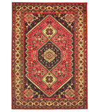 Handwoven luxury red antique rug with intricate floral and geometric patterns, detailed borders