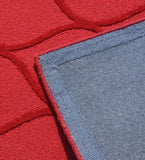 Handcrafted red wool rug with embossed modern wave design