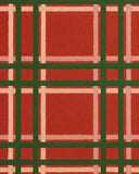 Red and green tartan Christmas rug for seasonal décor.