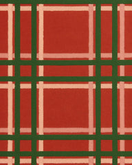 Red and green tartan Christmas rug for seasonal décor.
