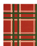 Plaid Christmas area rug with classic holiday colors.