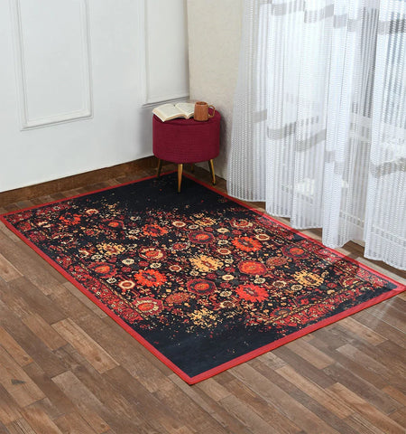 Machine washable red area rug with vintage patterns.