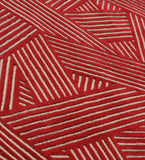 Contemporary hand-tufted rug with bold red and beige geometric design.