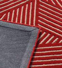 Designer modern wool rug handcrafted in red and beige tones.