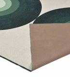 Modern geometric arch rug with earthy green tones and cream background, handwoven luxury design