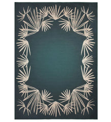 Rich teal area rug with deep jewel tones.