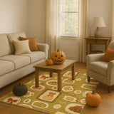 Cozy living room with beige sofa, armchair, fall-themed pumpkin rug, wooden coffee table, and Halloween pumpkins