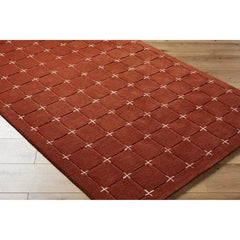 Luxury wool rug with grid pattern for living room décor.