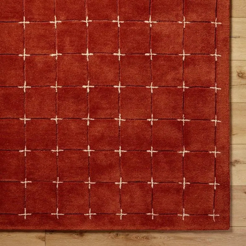 Contemporary red geometric rug made from premium wool.