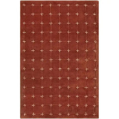 Hand-tufted rustic red wool rug with cream grid pattern.