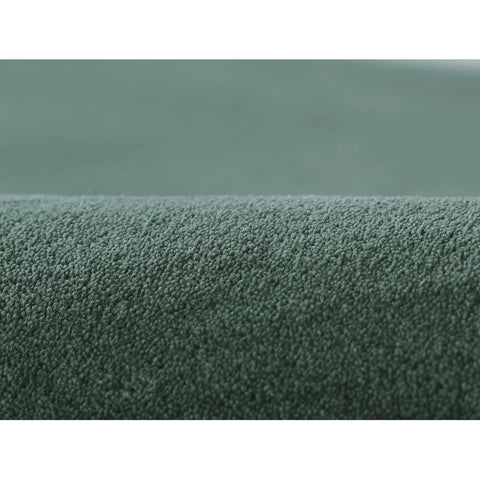 Minimalist sage green area rug with cream border - hand-tufted wool carpet for modern interiors