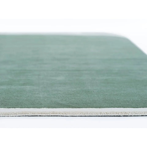 Elegant sage green and cream bordered rug - hand-tufted wool floor décor for home and office
