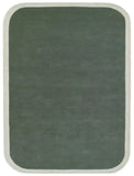 Hand-tufted sage green rug with cream border and rounded corners