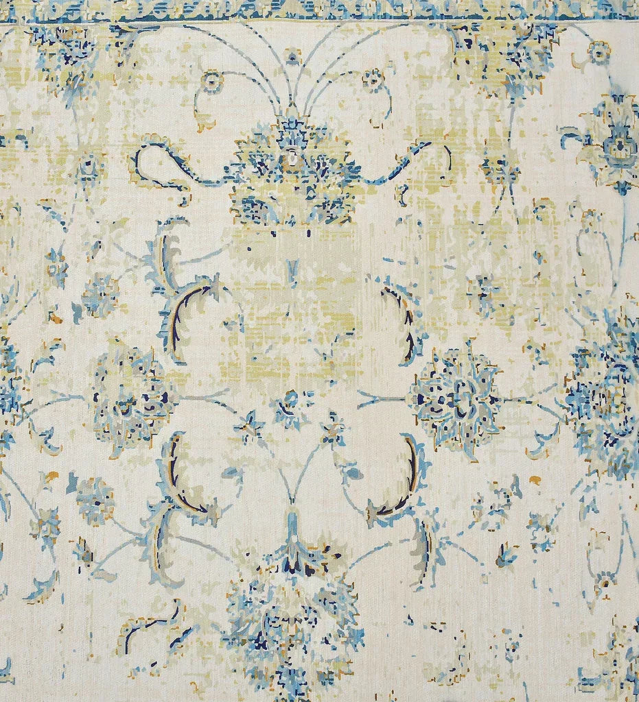 Distressed floral rug with romantic shabby chic design.