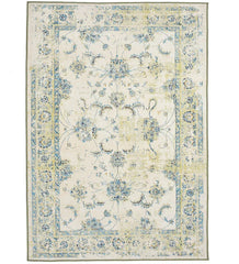 Shabby chic rug with faded pastel floral pattern.
