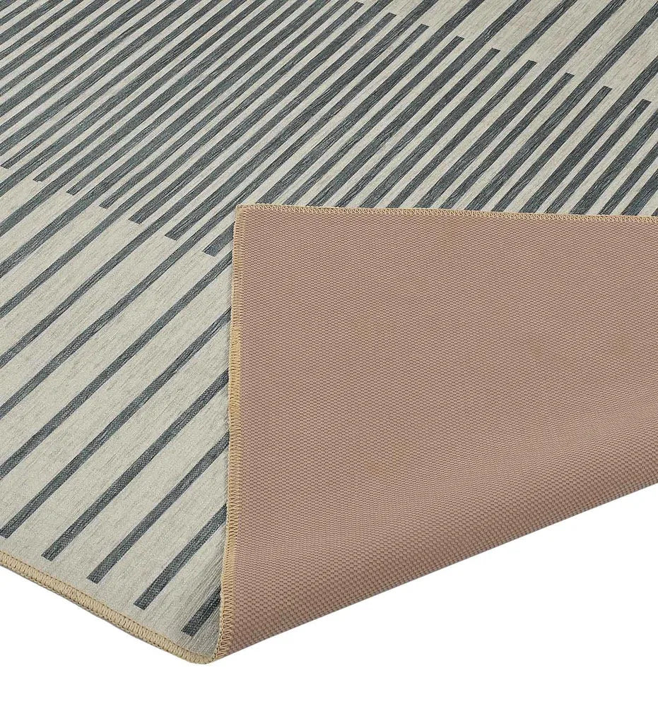 Durable silver-gray gradient rug for contemporary spaces.