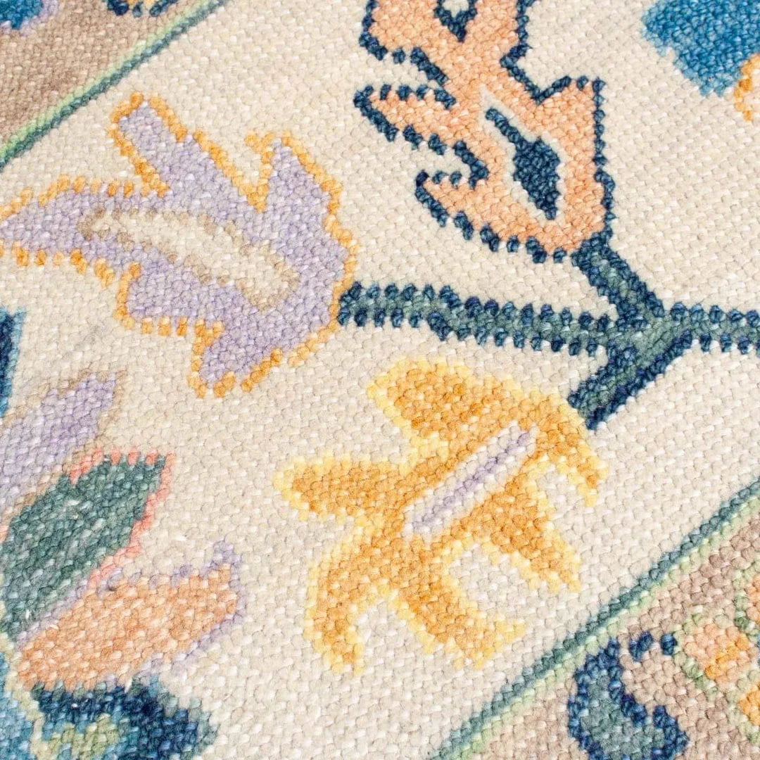 Sky blue wool area rug with intricate Oushak motifs