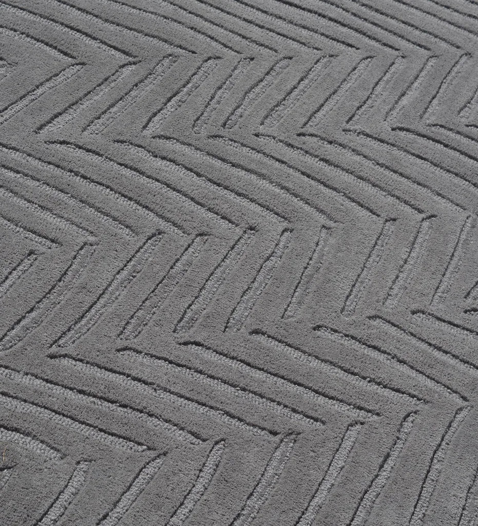 Luxury wool rug in slate grey with subtle textured detailing