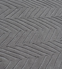 Luxury wool rug in slate grey with subtle textured detailing